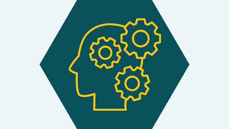 An icon of a head in profile with cogs