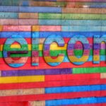 Colourful sign which says Welcome