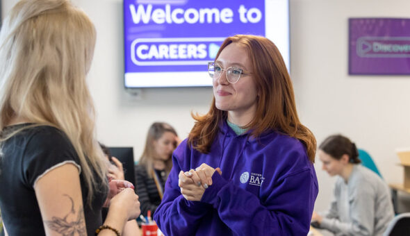 A Student Employability Coach talks to a student in the Careers Centre