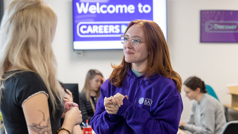 A Student Employability Coach talks to a student in the Careers Centre