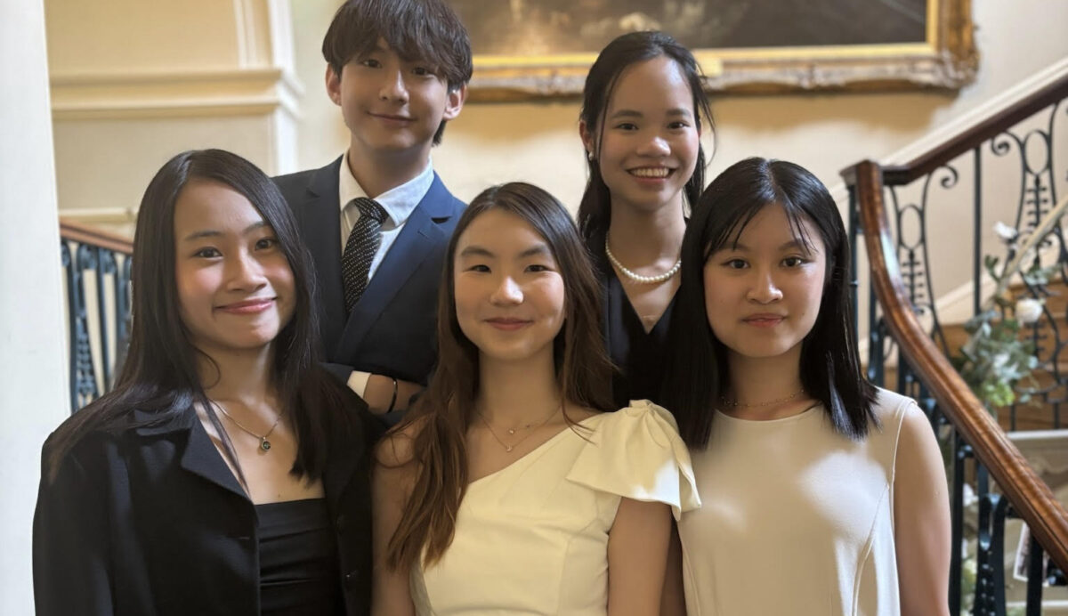A photograph of the 5 students who make up winning team Team Lemme