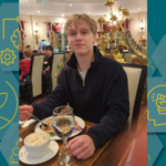 A photograph of George in a restuarant