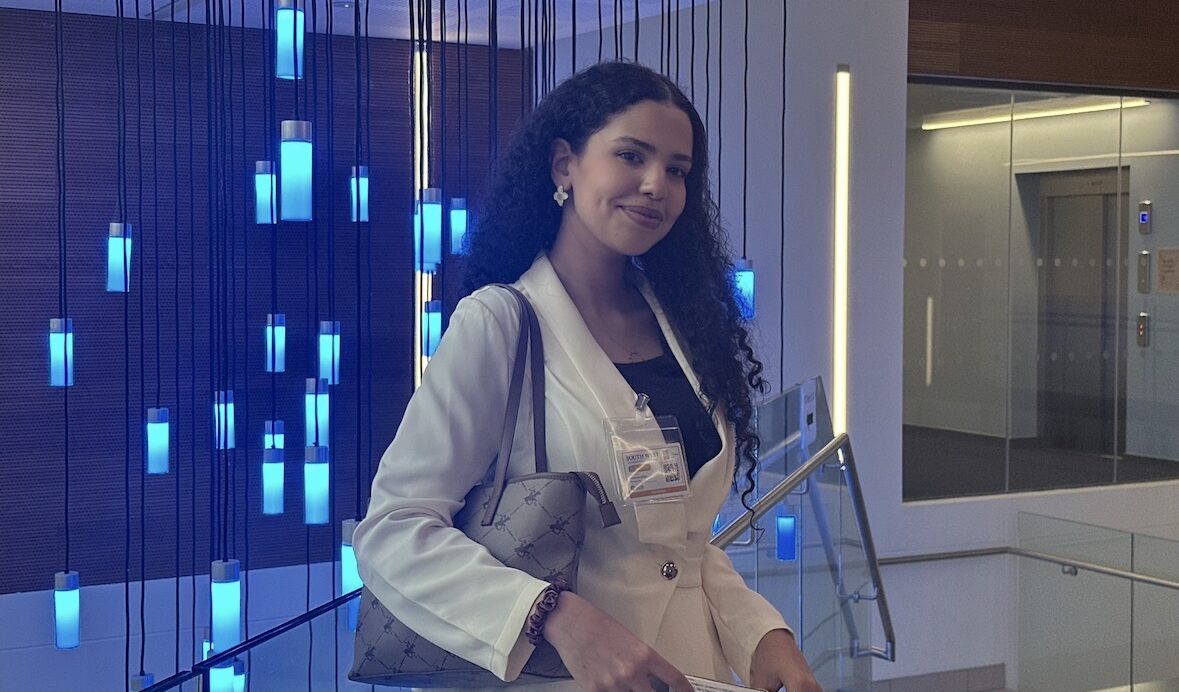 A photograph of Eya Labidi in the Department of Psychology
