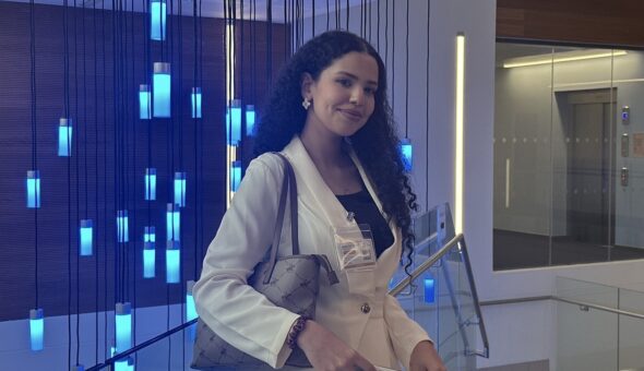 A photograph of Eya Labidi in the Department of Psychology