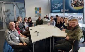 Group of people around a table.