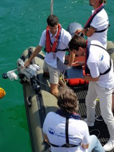 The team on the boat with the drone and ready to compete.