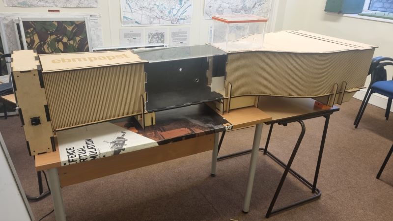 a portable wind tunnel on a table in a classroom