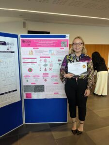 Prize winner Natalia posing with her poster