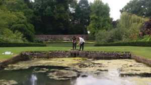 Two placement students collecting water samples at Dyrham Park.