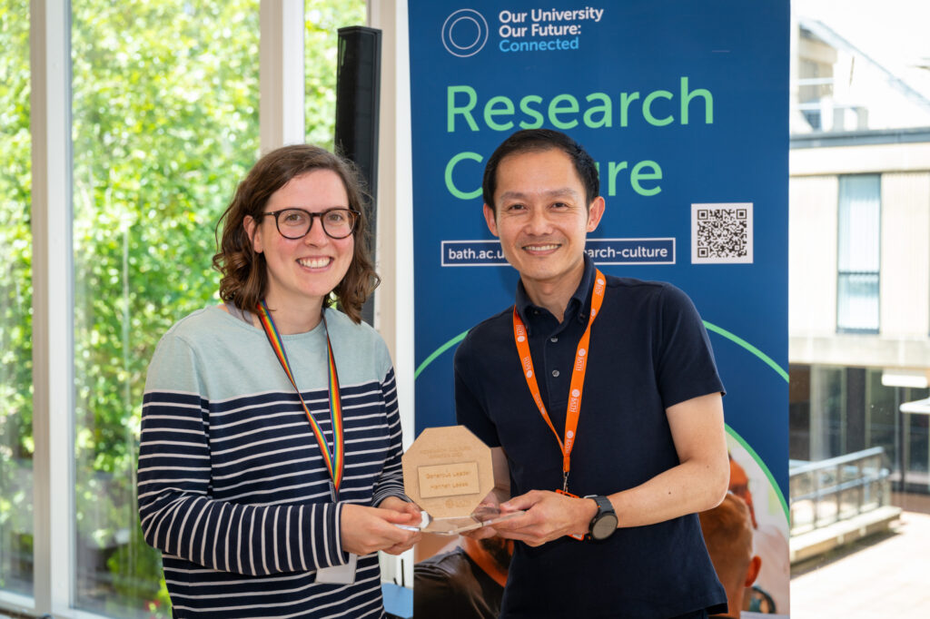 Hannah Leese (left) with her trophy, presented by Professor John Chew, Deputy Dean.