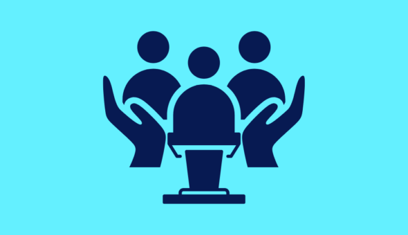 Hands supporting people behind a lectern