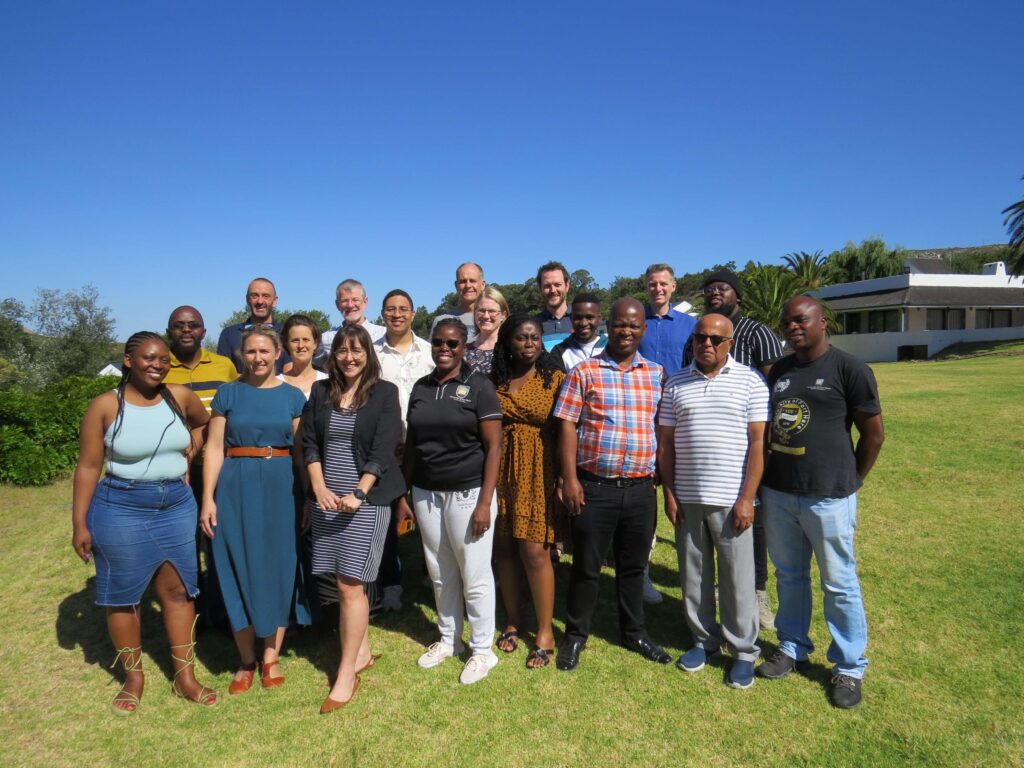 Students stood together outdoors in the south african sunshine