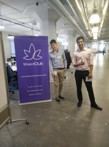 Ventsislav and Prithu (left to right) taking a picture with one of the companies incubated at the Runway.