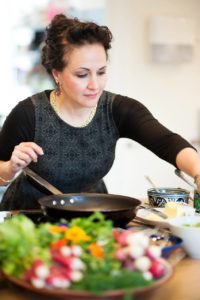 Simi preparing food