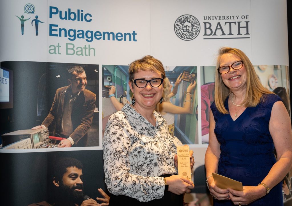 University of Bath researcher Sally Adams with Mrs. Margaret White on the award podium during the award presentation 