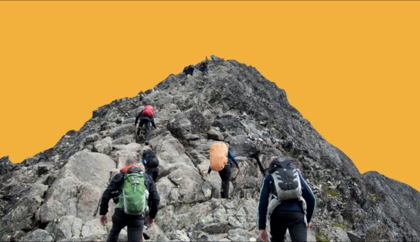 Several people in mountaineering gear climbing towards a mountain summit. Edited against a bright gold background