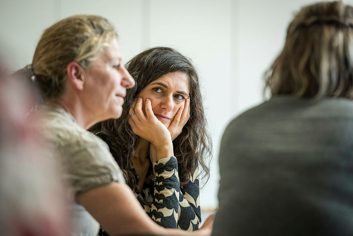 Three people taking part in an event,