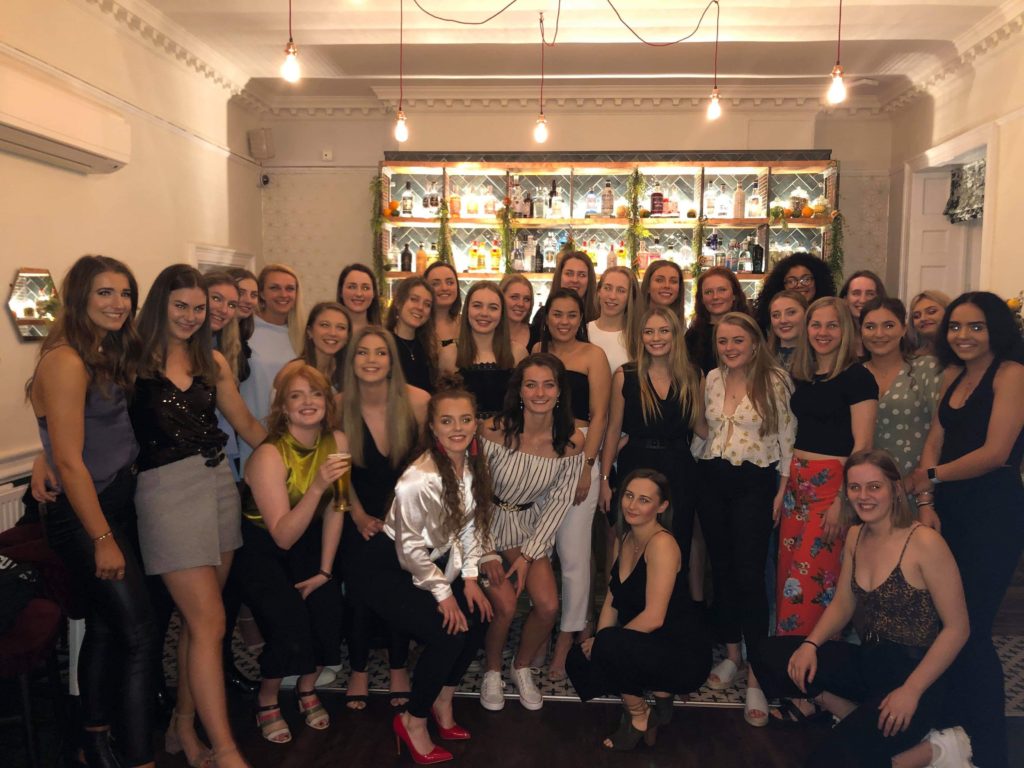 A group shot of the University of Bath netball players at their end of season party