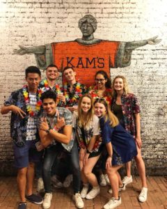 A group of students in Hawaiian shirts