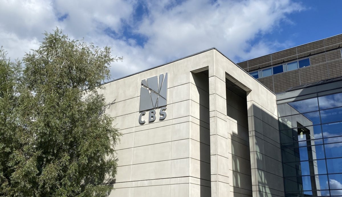 A CBS campus building with lots of bikes parked in front of it