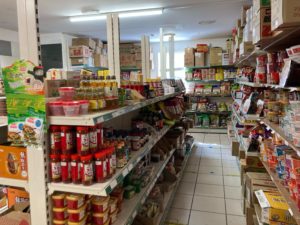 A snapshot of the inside of the Chinese supermarket "Hondo", showing rows of packaged goods.