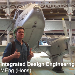 Me in fron of an aeroplane with the text 'Integrated Design Engineering MEng (Hons)