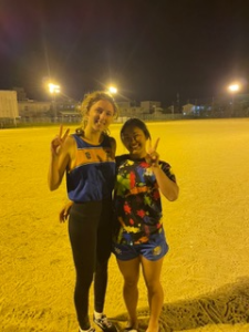 Playing rugby.