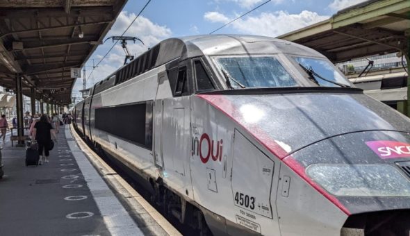 A modern train at a station in Europe