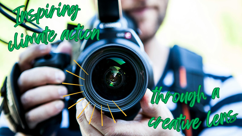 Image of someone holding up a camera. Words that read: "Inspiring climate action through a creative lens".