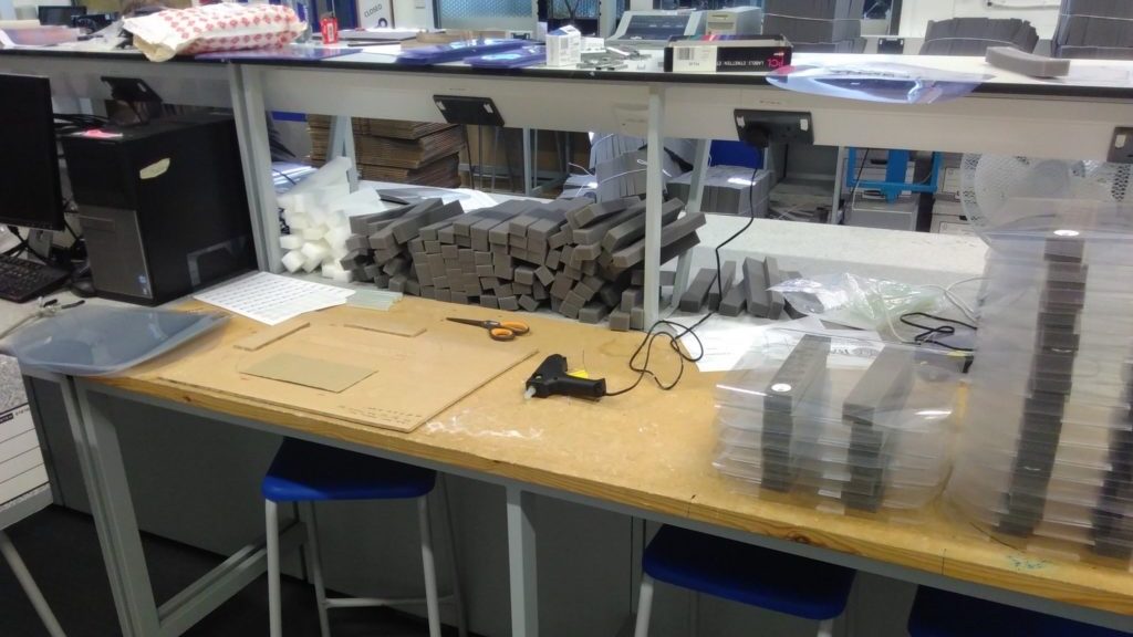 A workstation in the Mech Eng teaching lab where face shields are being made.