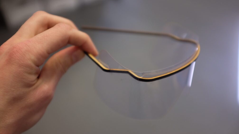 A completed eye shield with MDF frame and acetate visor.