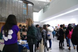 Students networking in the Chancellors Building foyer